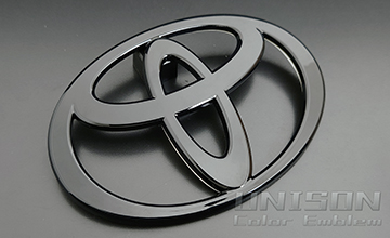 ヤリスUNISON-純正エンブレム改 Tマーク(ウルバーノ純正)